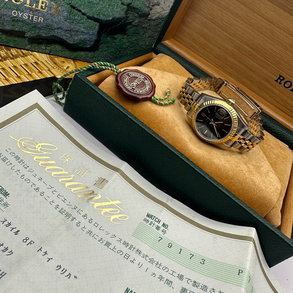 Rolex Datejust 79173 with Black Dial and Gold Bezel
